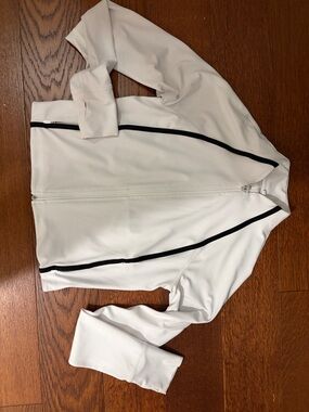 Athleta light weight excercise jacket with Black Trim size small/petite.